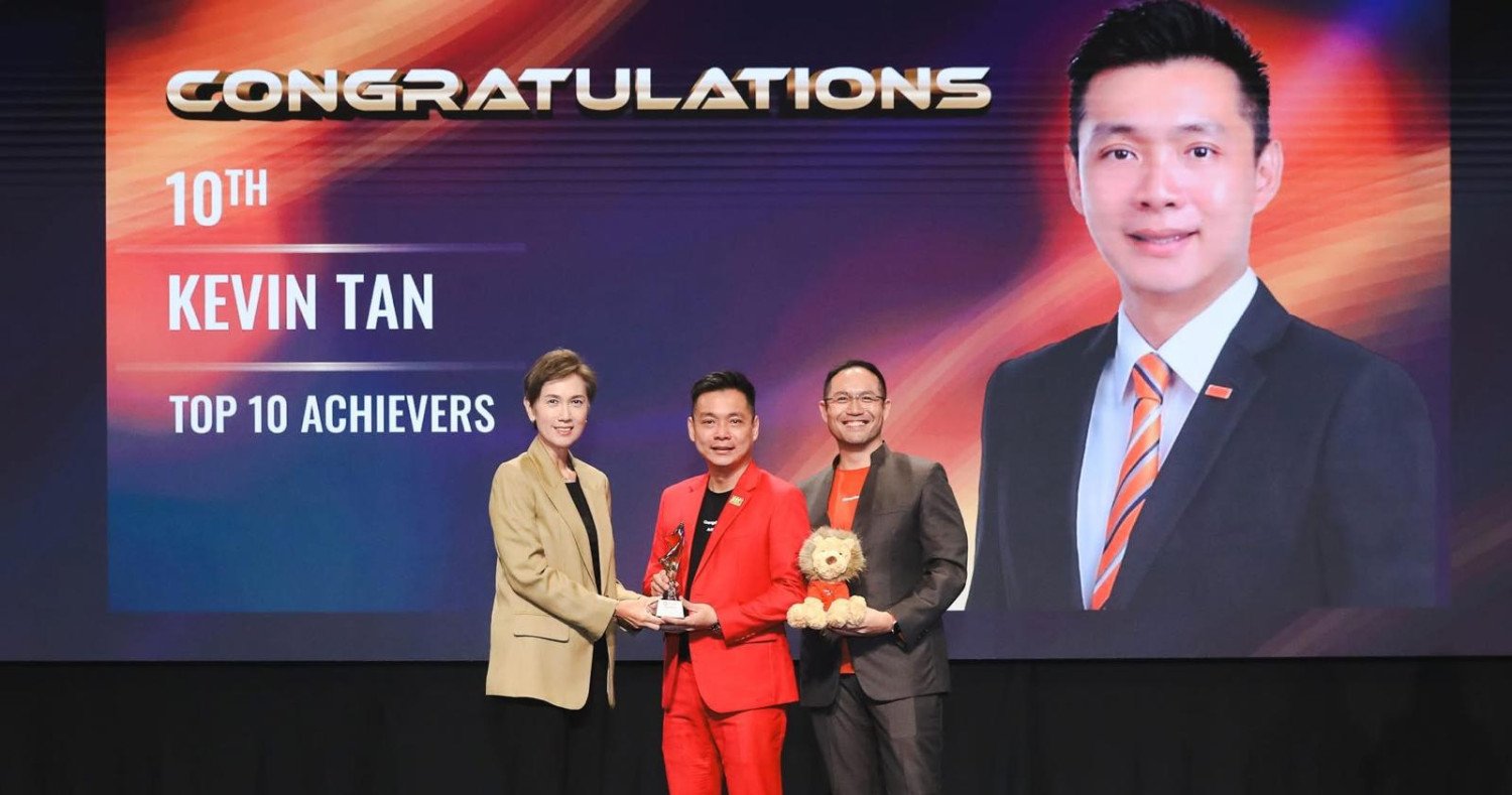 kevin-tan-—-a-shining-star-and-million-dollar-achiever-of-landed7772-orangetee.